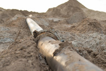 Steal Big Pipeline On A Sand. Old Pipes Joint In A Desert