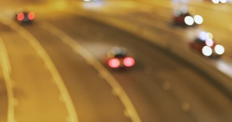 Wall Mural - Blurry view of traffic in the city at night