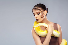 Beautiful Brunette Women With A Albine Python. Fashion Makeup