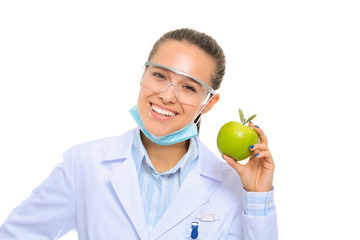 Dentist medical doctor woman hold green fresh apple in hand and tooth brush. Dentist doctors. Woman doctors