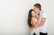 © Prostock-studio - Young couple hugging and kissing