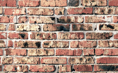 old grunge light red brick wall seamless texture. Industrial background,