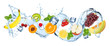 Leinwandbild Motiv water splash panorama with various fruits ice cubes and fresh peppermint leafs isolated on white background