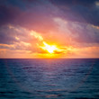 © Mcdonojj - Halo effect surrounding the morning sunrise over the ocean. / Morning Sunrise Halo.