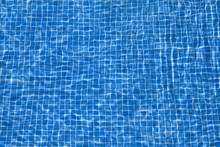 Blue Tiles At The Bottom Of The Pool