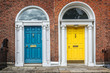 Blue and yellow classic doors in Dublin, example of georgian typical architecture of Dublin, Ireland