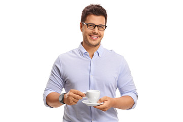 Sticker - Elegant guy holding a cup and looking at the camera