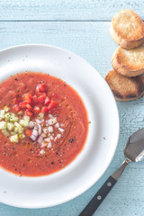 Wall Mural - Portion of gazpacho on the wooden table