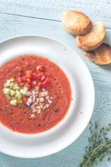 Wall Mural - Portion of gazpacho on the wooden table