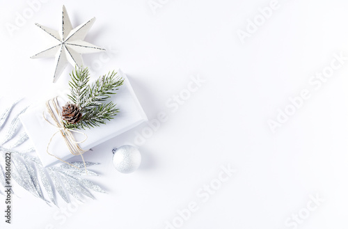 Fotografia An Arrangement of Christmas Decorations and a Gift Box
