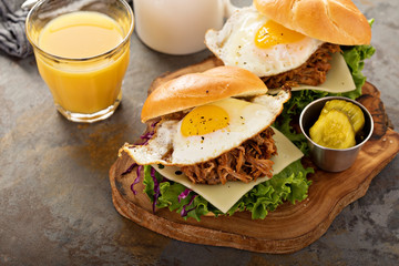 Wall Mural - Pulled pork breakfast sandwiches with fried egg