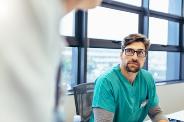 Wall Mural - Medical professional during briefing in boardroom