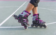 © zilber42 - Roller skate legs close up in skatepark. Low section. Roller skates is extreme sport.