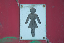 Old Ladies Toilet Sign On Red Door