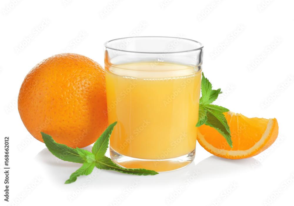 Composition with glass of fresh juice and oranges on white background