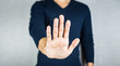 © kaipong - Man making stop sign, open hand, making five hand gesture and no face