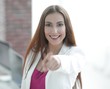 © ASDF - business lady pointing to the front