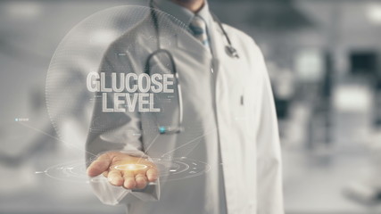 Canvas Print - Doctor holding in hand Glucose Level