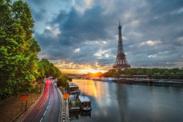 scenic view over the eiffel tower from a bridge at sunrise. paris, france. beautiful travel backgrou