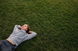 © Viktor Koldunov - Beautiful young european woman lays down on grass and rests