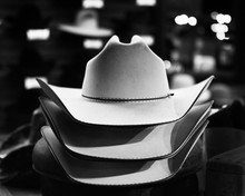 Black And White Felt Cowboy Hats In Western Retail Store, Under Lights.  
