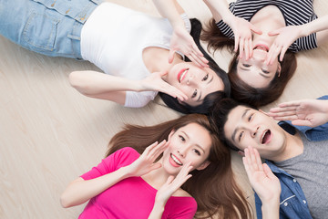 Wall Mural - young people lying on floor