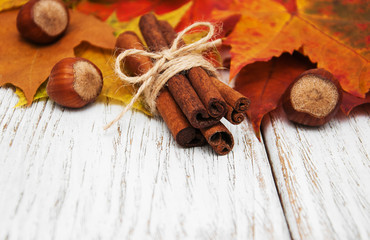 Autumn leaves with cinnamon and hazelnuts