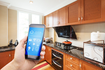 Canvas Print - smart phone in modern kitchen