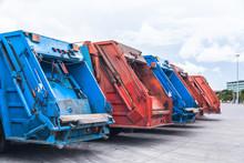 Several Cars Parked Garbage Truck For Transport To Garbage Collection.