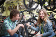 © Africa Studio - Young couple choosing bicycle in shop