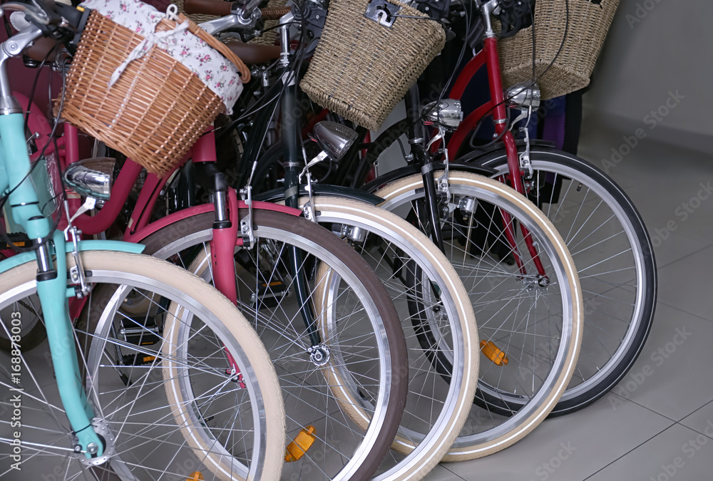 Row of new modern bicycles in shop