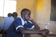© Hugh Sitton - Girl writing in the classroom