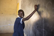 © Hugh Sitton - School girl in classroom. Kenya, Africa.