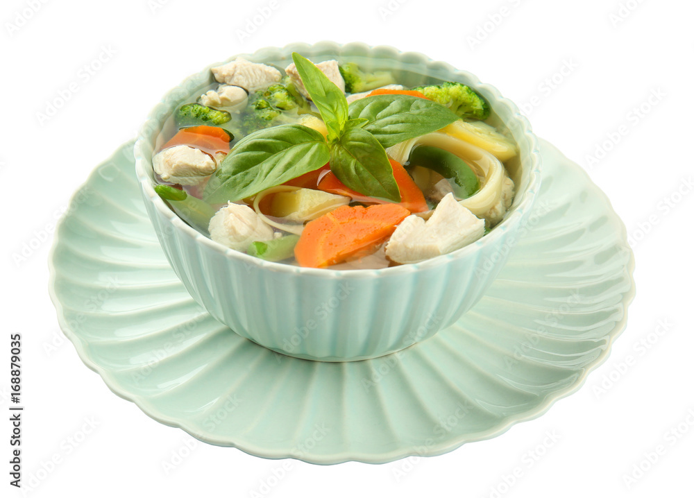Bowl with delicious turkey soup on white background
