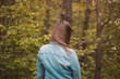 © Dawid - girl from behind red hair in forest waving hair
