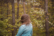 © Dawid - girl from behind red hair in forest waving hair