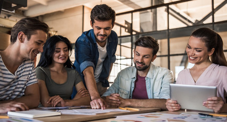 Wall Mural - Young business team working