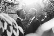 © michela ravasio/Stocksy - Elegant gay couple enjoying the moment together