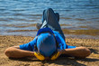© Iryna - A worker is resting on the river bank.