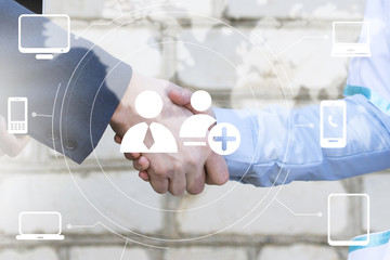 Poster - Businessman handshake on media computer business background, connections concept.