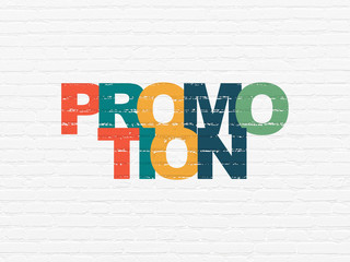 Advertising concept: Promotion on wall background