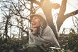 © liderina - Woman outdoor. Woman relaxing outdoor. Girl looking away.