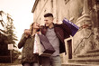 © liderina - Couple in shopping together. Happy couple shopping together and having fun.