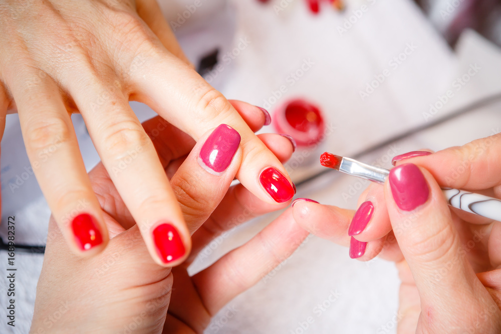 Manicure In Progress Beautiful Manicured Woman S Nails With Red