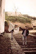 © liderina - Happy couple outdoor. Couple walking on the stairs.