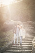 © liderina - Young couple walking on the street. Couple enjoying together in spring day.