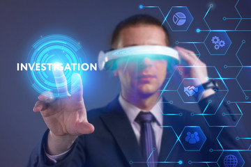 Business, Technology, Internet and network concept. Young businessman working on a virtual screen of the future and sees the inscription: Investigation