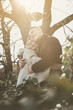 © liderina - Happy couple enjoying together in outdoors.  Couple in hug.