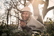 © liderina - Woman using smart phone.  Young girl typing text messages on phone.