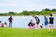 © Nipaporn - Blurred background of people activities in park.